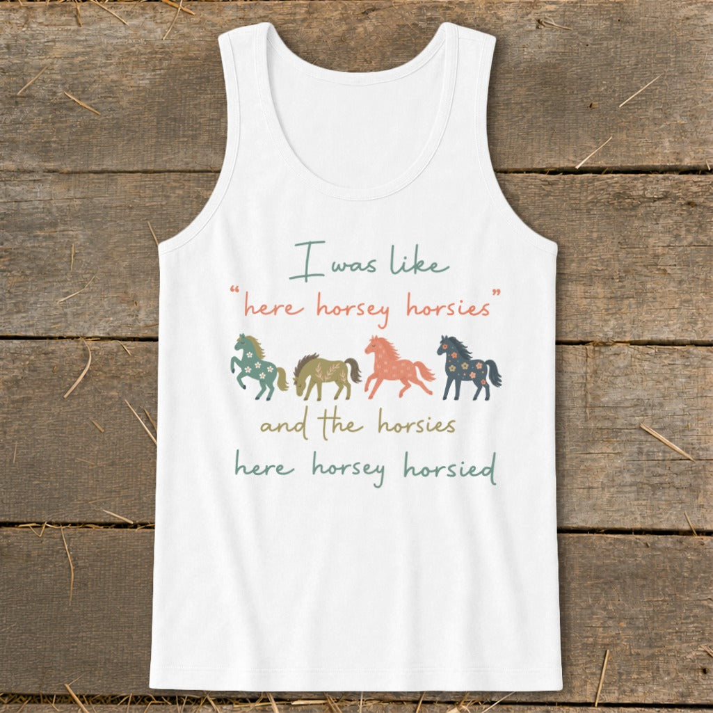 White tank top with a horse graphic and text "I was like 'here horsey horsies' and the horsies here horsey horsied."