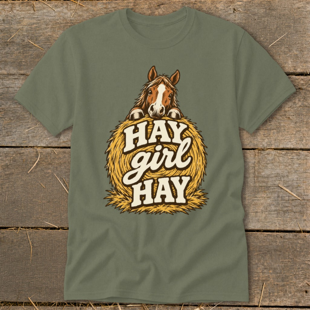 T-shirt with horse peeking over hay bale, text "HAY girl HAY".