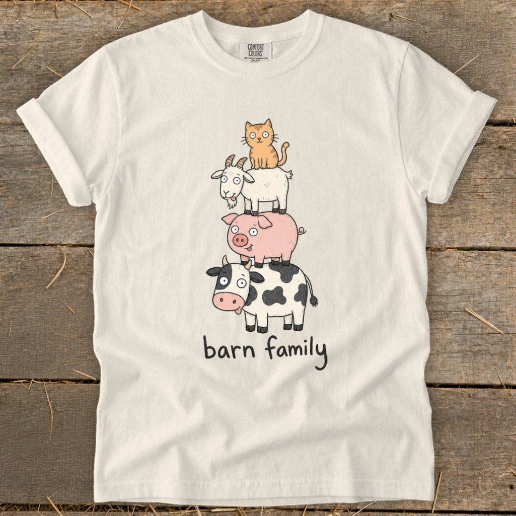 T-shirt with cartoon cow, pig, goat, and cat stacked with "barn family" text.