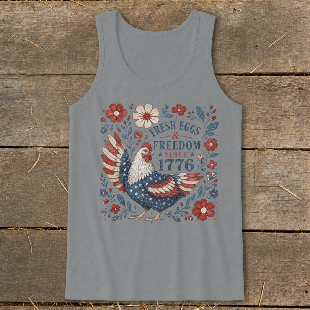 Chicken with American flag wings on a tank top, reads "Fresh Eggs & Freedom Since 1776".