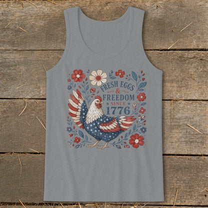Chicken with American flag wings on a tank top, reads "Fresh Eggs & Freedom Since 1776".