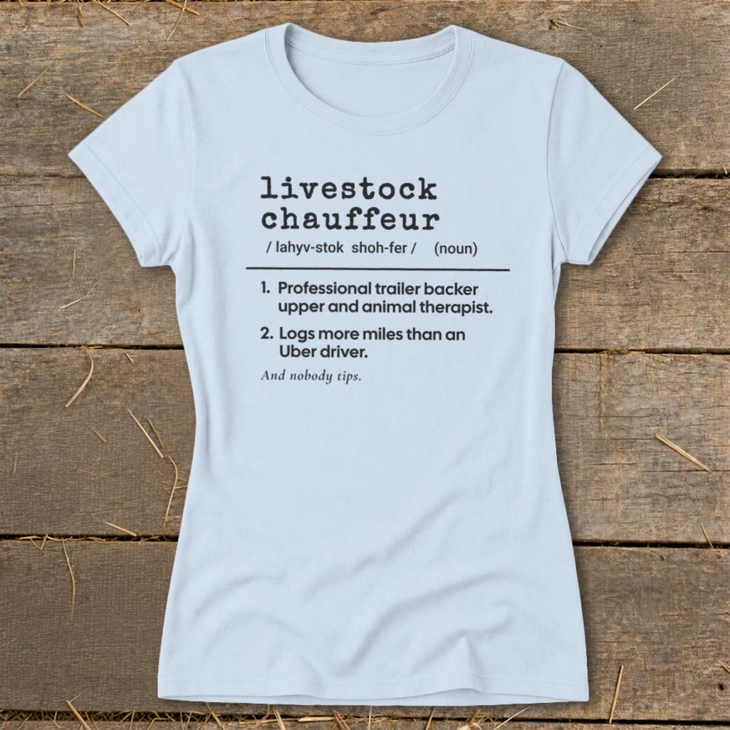 Light blue t-shirt with black text defining "livestock chauffeur".