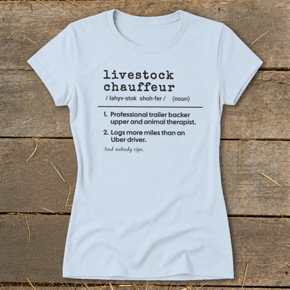 Light blue t-shirt with black text defining "livestock chauffeur".