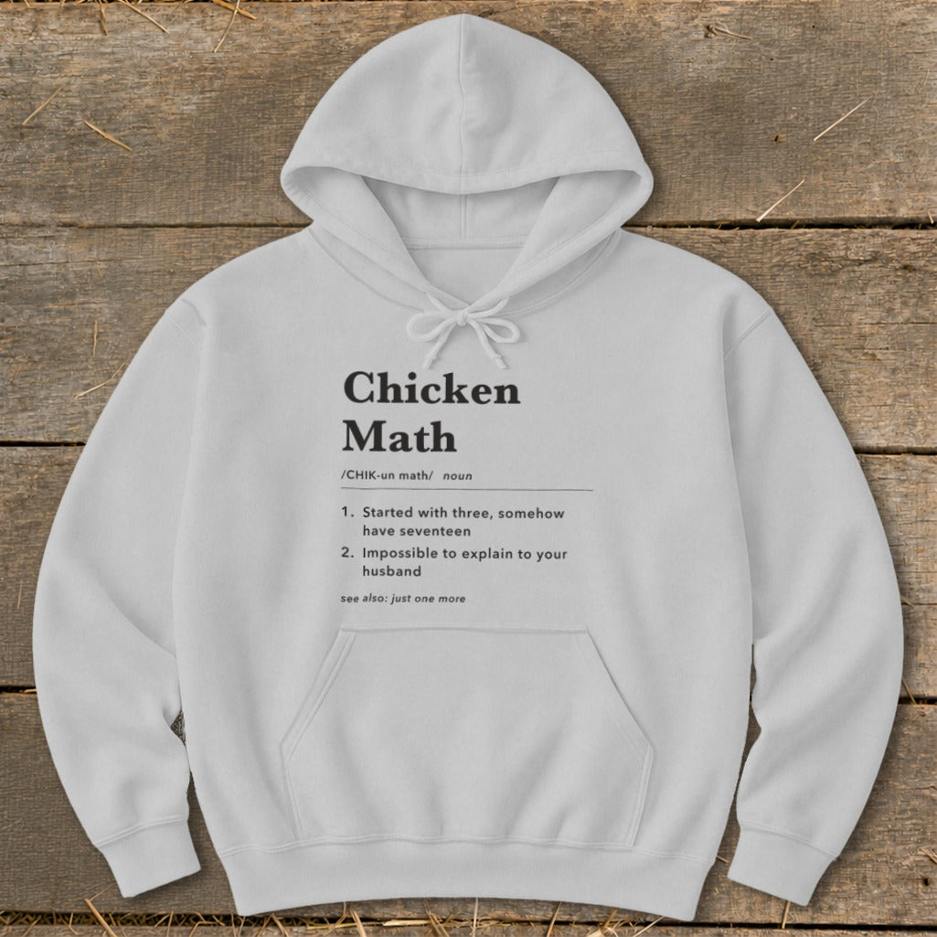 White hoodie with "Chicken Math" definition printed on the front.
