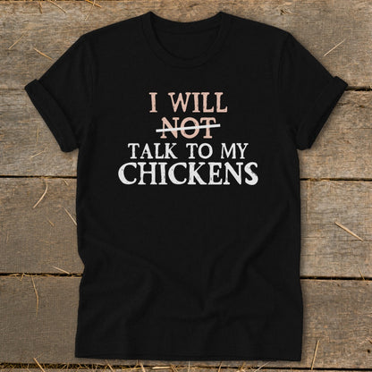 Black t-shirt with "I Will Not Talk To My Chickens" graphic.