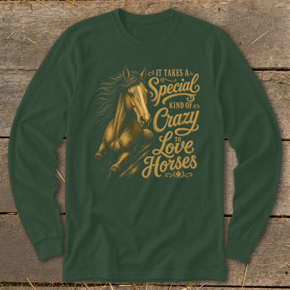 Green long-sleeve shirt with gold text and illustration of a horse.