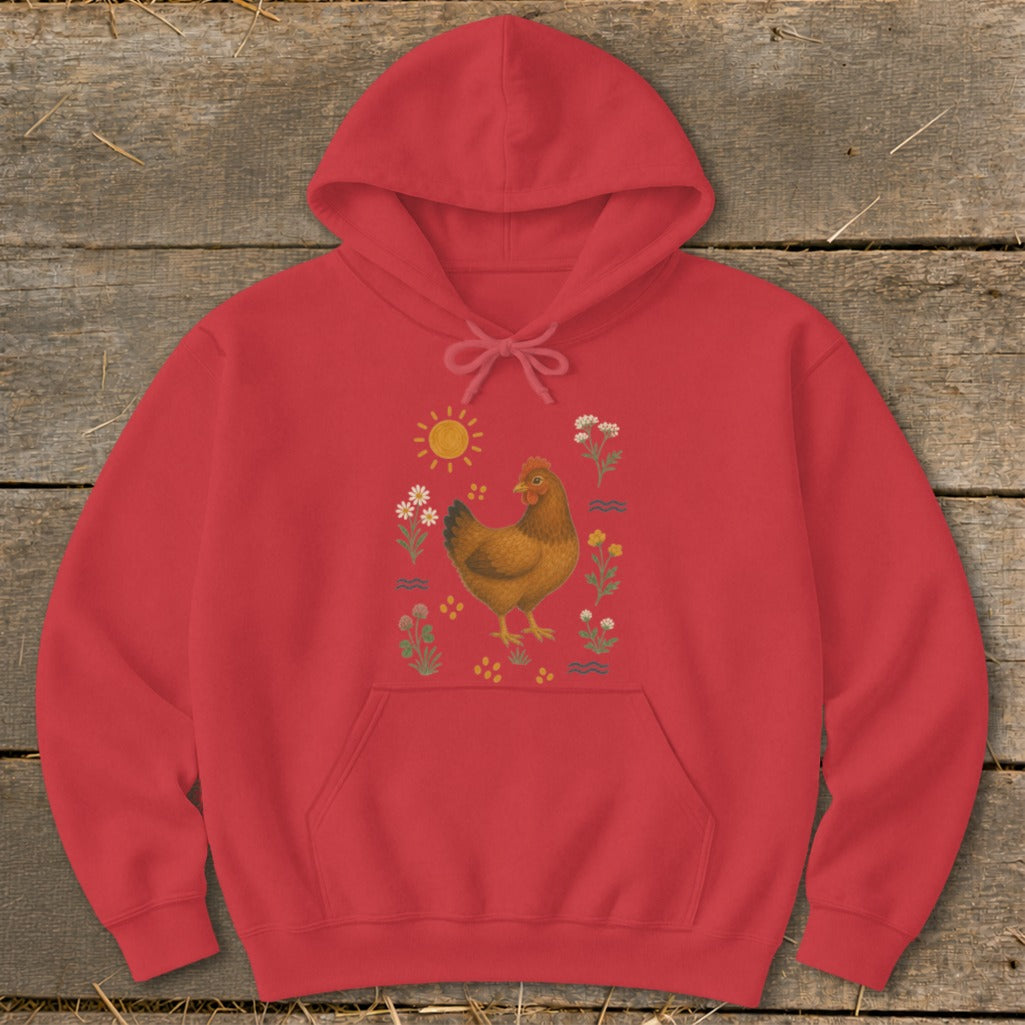 Red hoodie with a brown hen illustration surrounded by flowers, sun, and wavy lines.