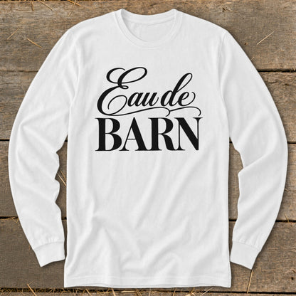 White long-sleeved shirt with "Eau de BARN" graphic print.