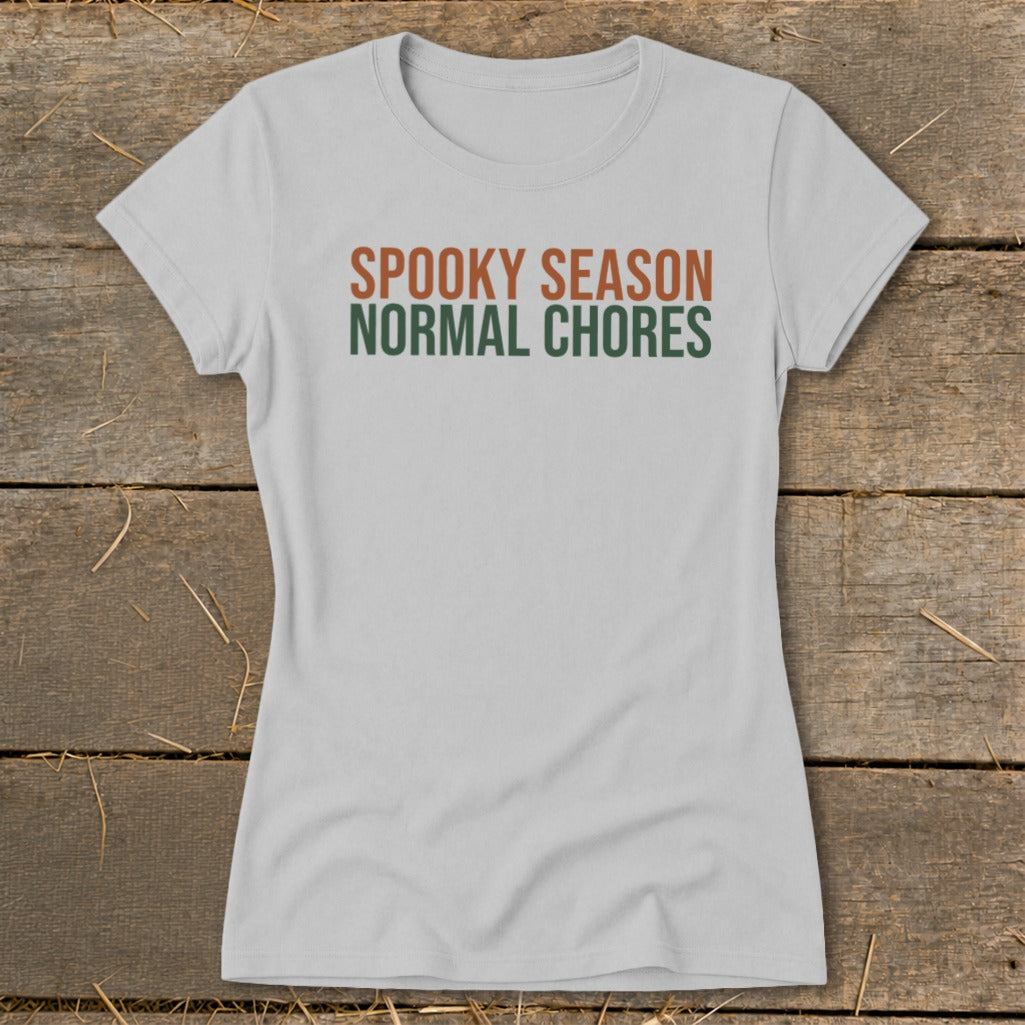 Light gray t-shirt with text "SPOOKY SEASON NORMAL CHORES".