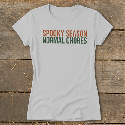 Light gray t-shirt with text "SPOOKY SEASON NORMAL CHORES".