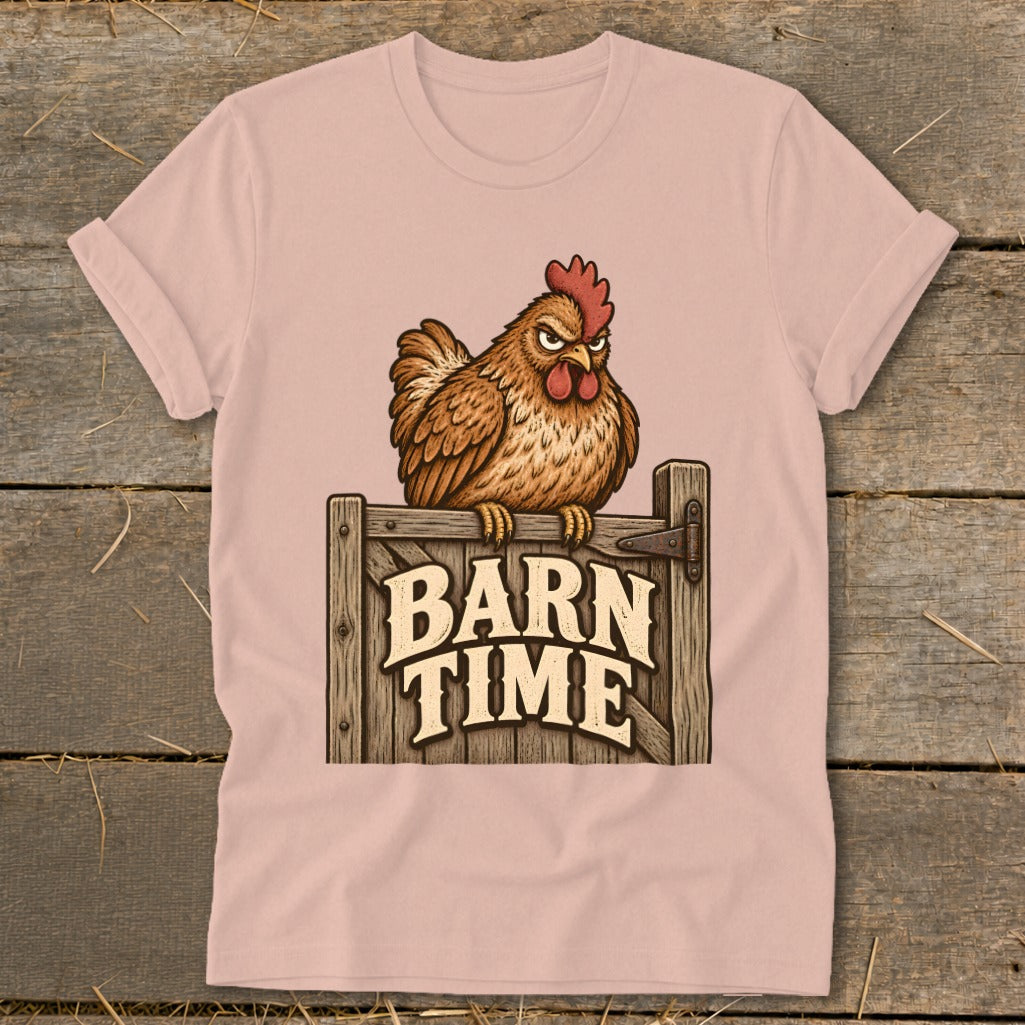 Pink t-shirt featuring a grumpy chicken perched on a wooden sign that reads "BARN TIME".