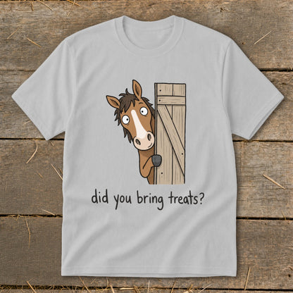 Light grey t-shirt with cartoon horse peeking from a wooden gate asking, "did you bring treats?"