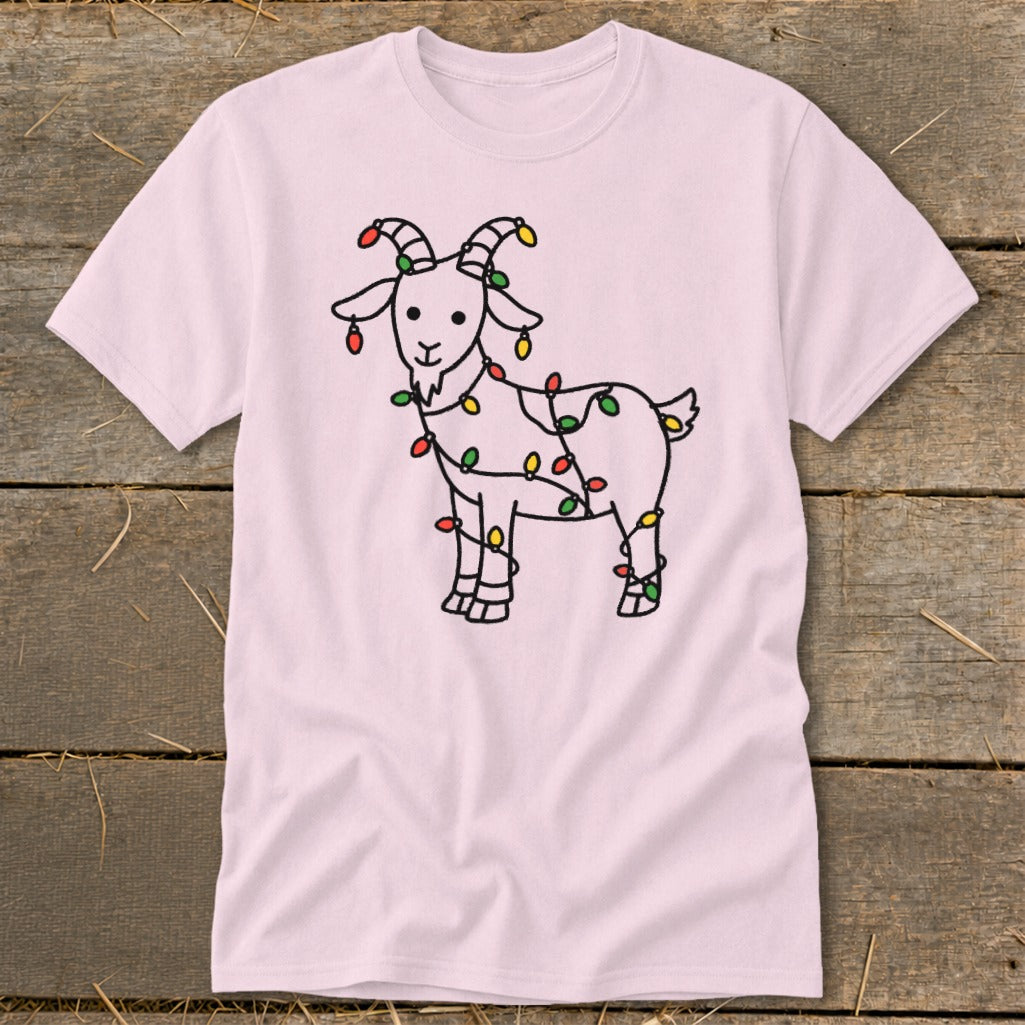 Pink t-shirt with a black outline drawing of a goat wrapped in colorful Christmas lights.