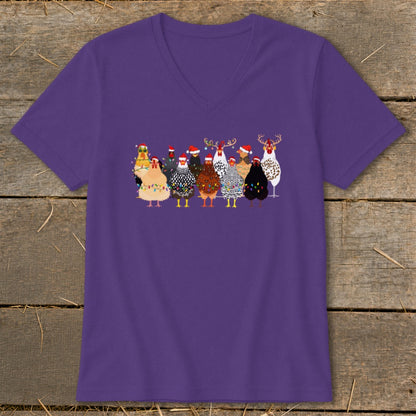 Group of chickens wearing Santa hats and Christmas lights, one with antlers.