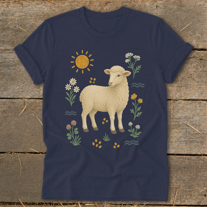 Navy t-shirt with a cream sheep illustration surrounded by flowers and sun.