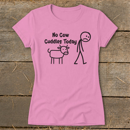 Pink t-shirt with "No Cow Cuddles Today" text, a stick figure, and a cow.