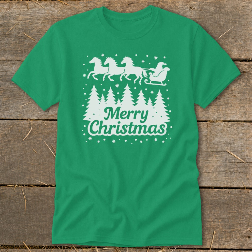Green t-shirt with white Christmas graphic of Santa's sleigh and reindeer, trees, and "Merry Christmas".
