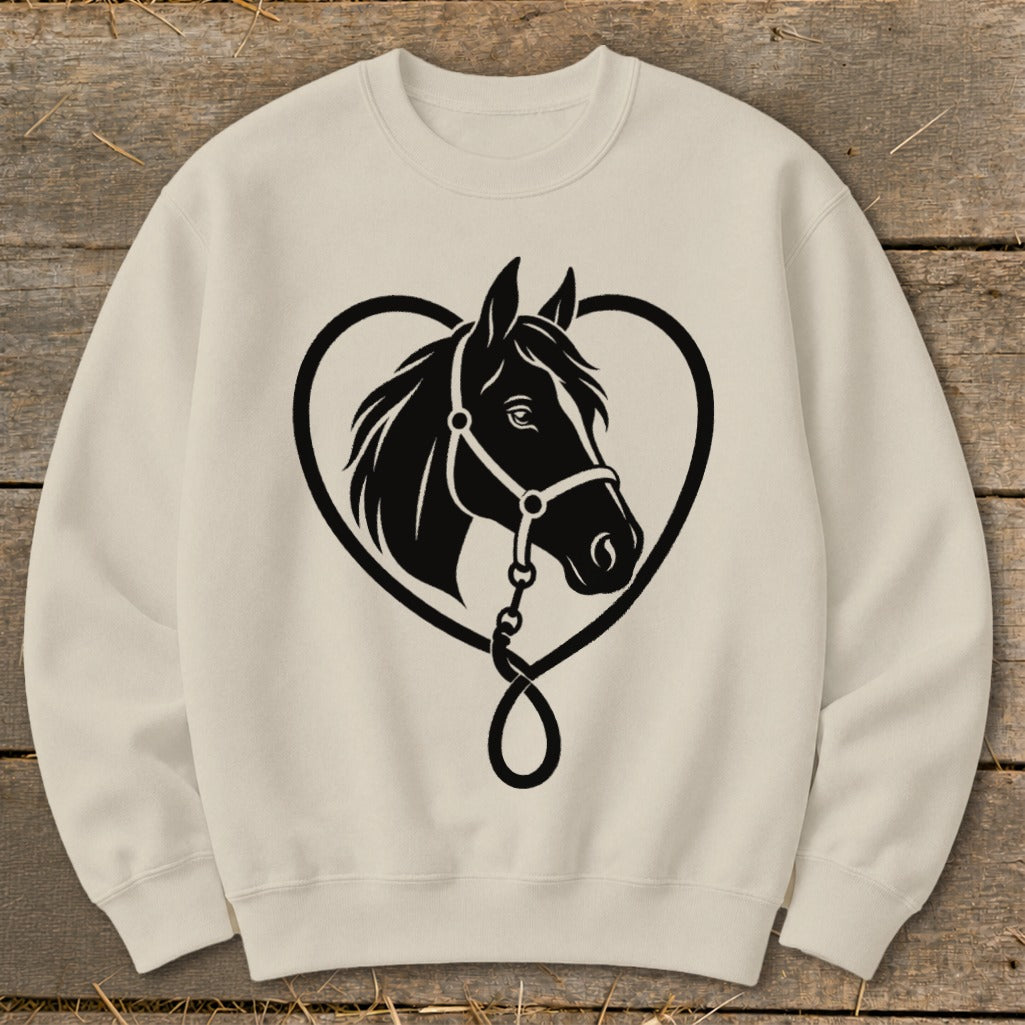 A cream-colored crewneck sweatshirt featuring a black graphic of a horse head inside a heart.