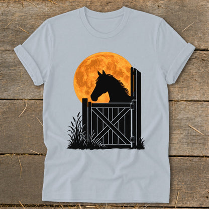 Light gray t-shirt featuring a black silhouette of a horse looking over a stable door against a large orange moon.