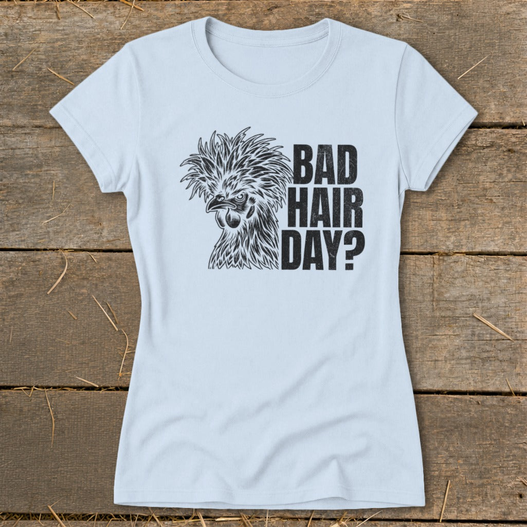 Light blue t-shirt with a black illustration of a fluffy chicken and text reading "BAD HAIR DAY?".