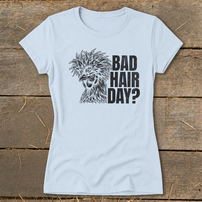 Light blue t-shirt with a black illustration of a fluffy chicken and text reading "BAD HAIR DAY?".