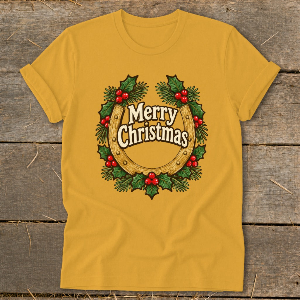 Yellow t-shirt with a horseshoe, holly, and "Merry Christmas" text graphic.