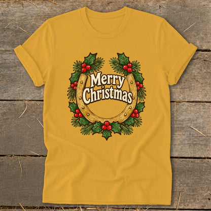Yellow t-shirt with a horseshoe, holly, and "Merry Christmas" text graphic.