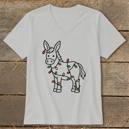 Line drawing of a donkey wrapped in colorful Christmas lights on a light grey t-shirt.