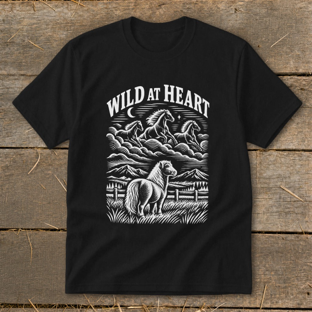 Black t-shirt with "Wild at Heart" text and horses in a landscape.