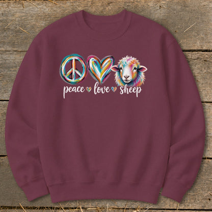 Maroon sweatshirt with colorful peace sign, heart, and sheep graphic and text.