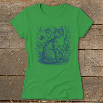Green t-shirt with blue sketch of a cat sitting among poppies and foliage.