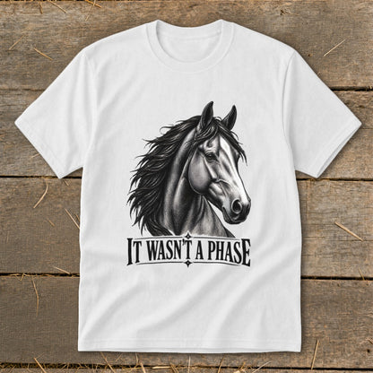 White t-shirt with a black and white drawing of a horse head and the text "IT WASN'T A PHASE".