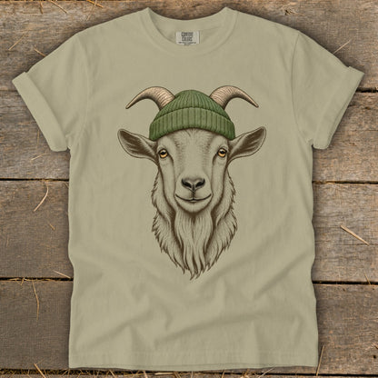 T-shirt featuring a drawing of a goat wearing a green beanie.