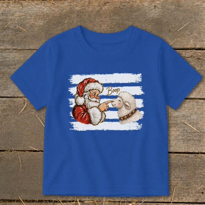 Santa booping a sheep with the word "Boop" on a blue t-shirt.