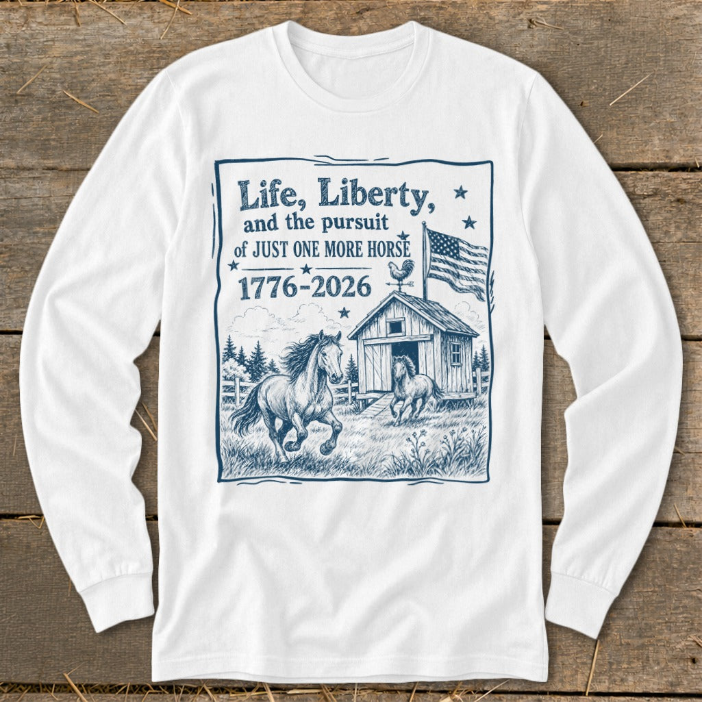 White long sleeve shirt with a blue graphic about life, liberty, and horses.