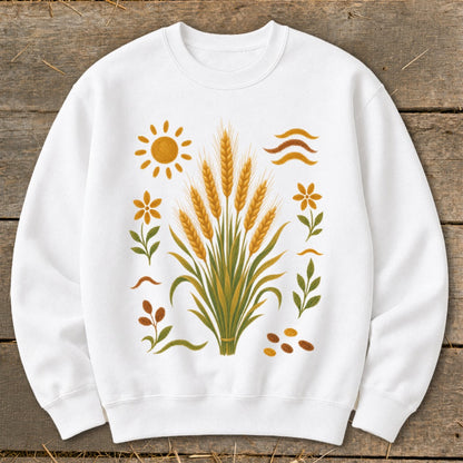 White sweatshirt featuring a wheat stalk graphic with sun, flowers, and leaves.
