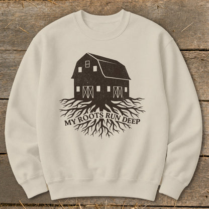 Cream sweatshirt with a dark brown graphic of a barn with roots and text "My Roots Run Deep".
