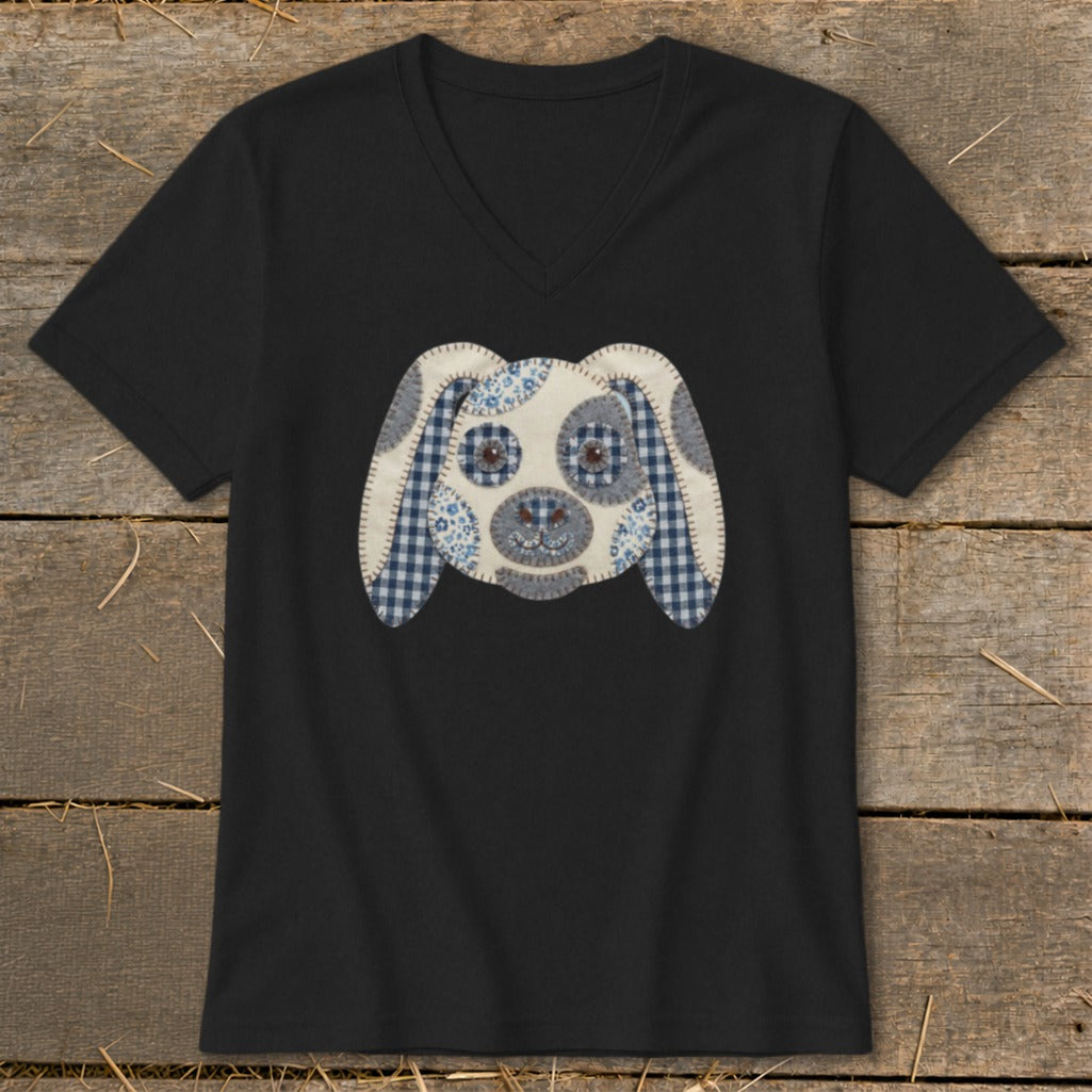 Black v-neck t-shirt with a fabric applique dog face design.