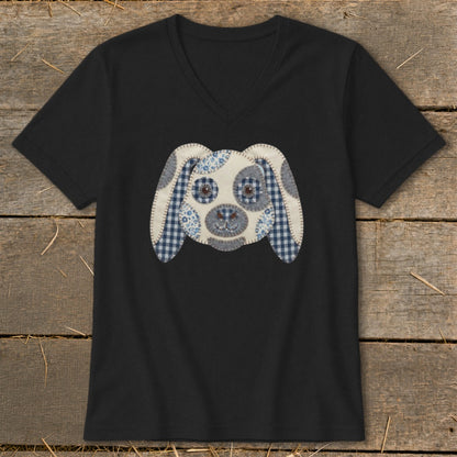 Black v-neck t-shirt with a fabric applique dog face design.