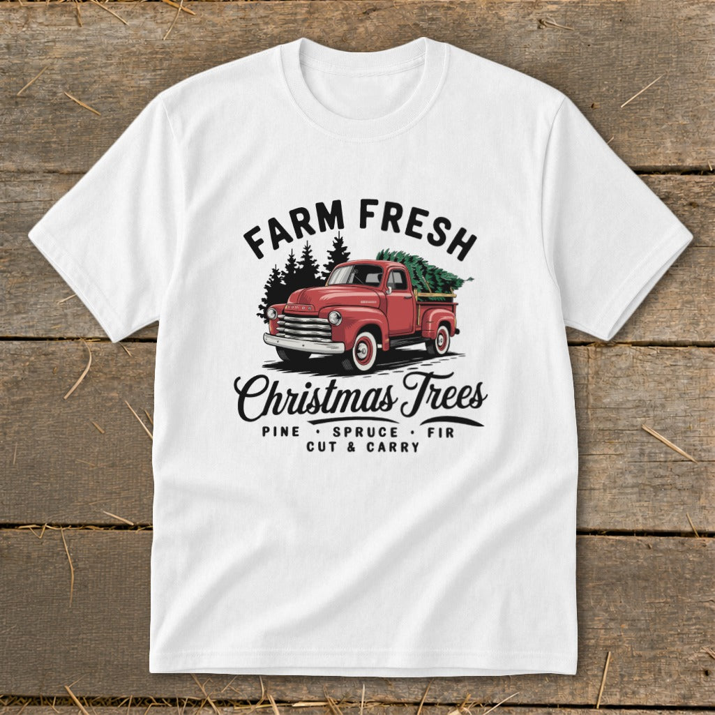 White t-shirt with "Farm Fresh Christmas Trees" text and red truck illustration.