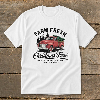 White t-shirt with "Farm Fresh Christmas Trees" text and red truck illustration.