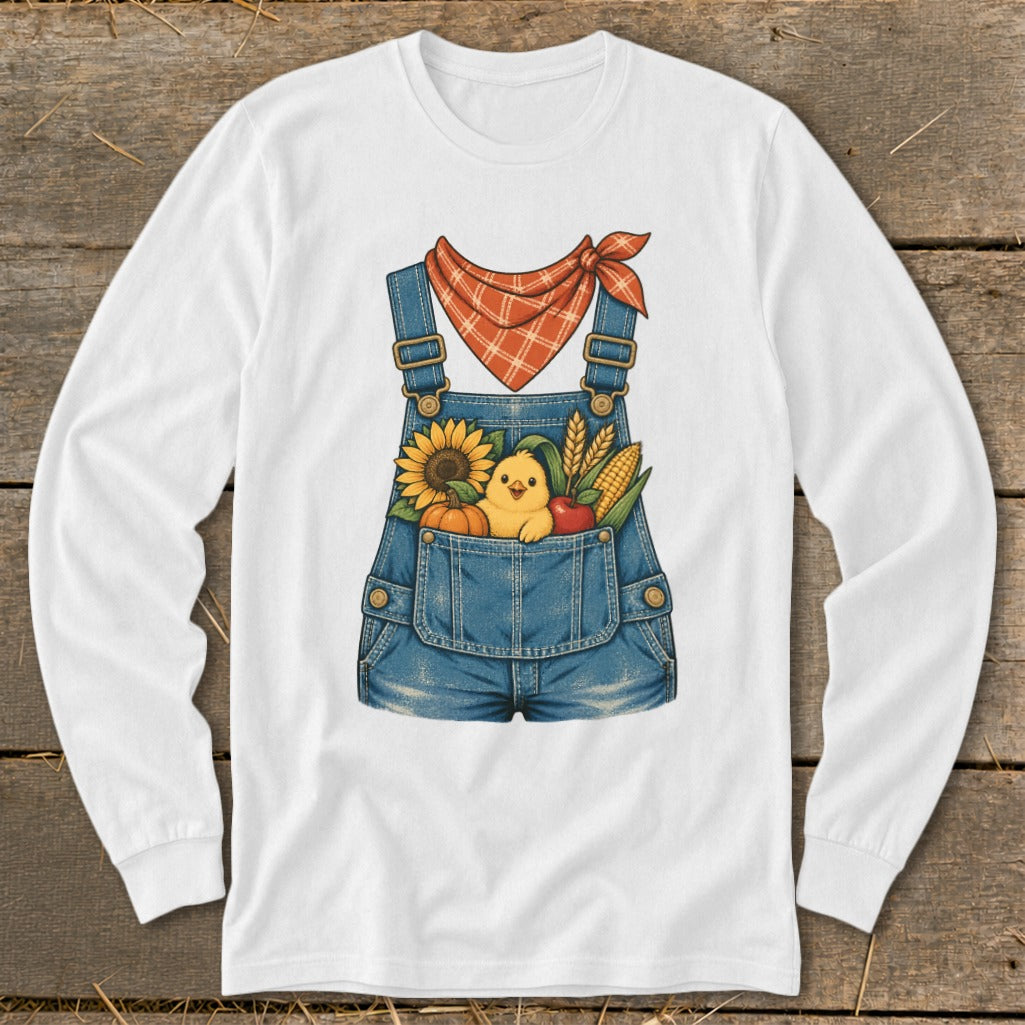 White long-sleeve shirt with denim overalls graphic and farm harvest elements.