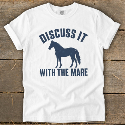 White t-shirt with navy graphic "DISCUSS IT WITH THE MARE" and horse silhouette.