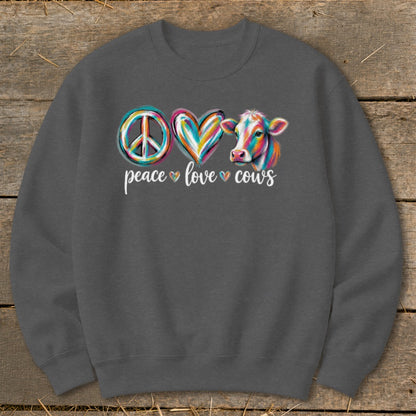 Peace, love, and cows graphic with colorful peace sign, heart, and cow.