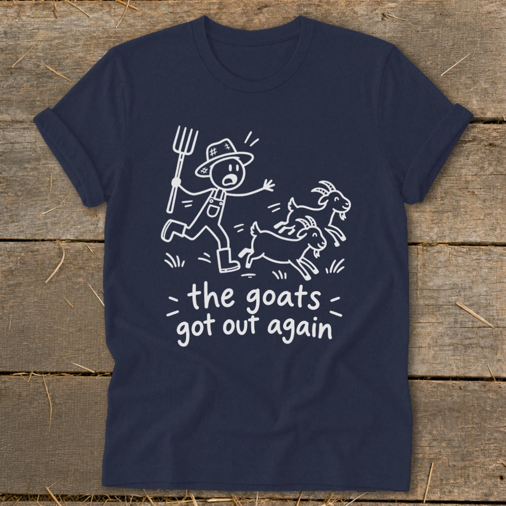 Dark blue t-shirt with white illustration of a farmer chasing goats, text reads "the goats got out again".