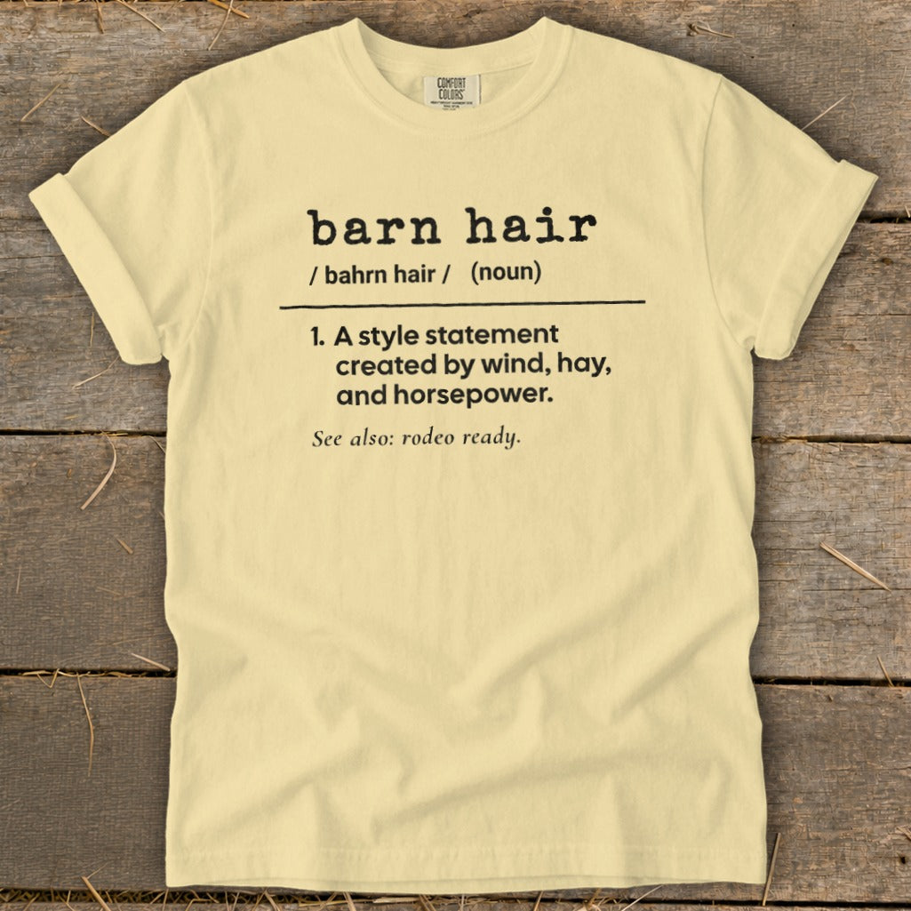 Light yellow t-shirt with "barn hair" definition printed in black text.
