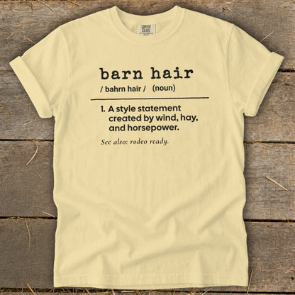 Light yellow t-shirt with "barn hair" definition printed in black text.