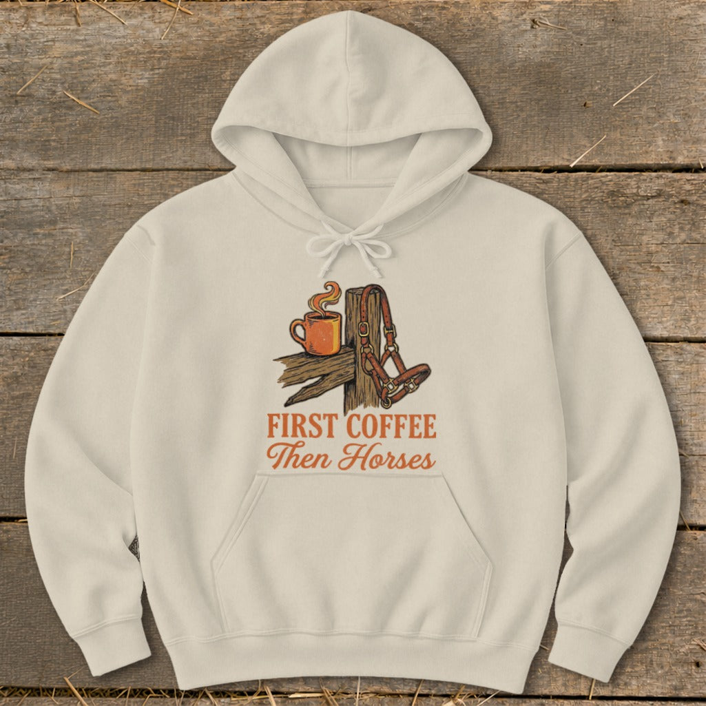 Cream hoodie with "First Coffee Then Horses" graphic featuring coffee and horse halter.