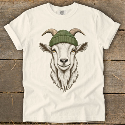 Goat with green beanie and horns on a cream t-shirt