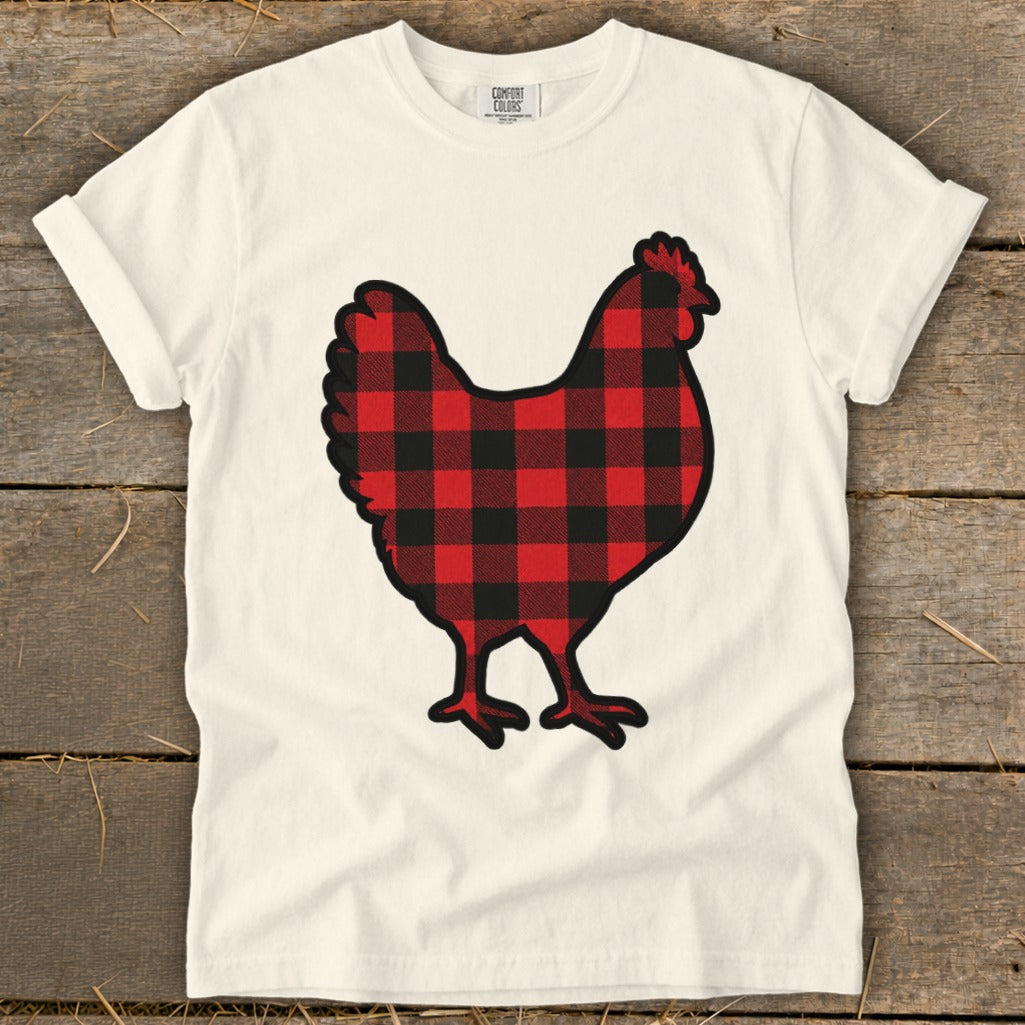 White t-shirt with a red and black buffalo plaid chicken graphic.